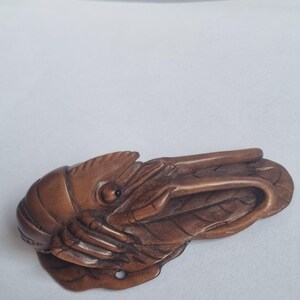 Vintage finely detailed hand-carved boxwood netsuke  Japanese crayfish shrimp lobster on leaves signed to base