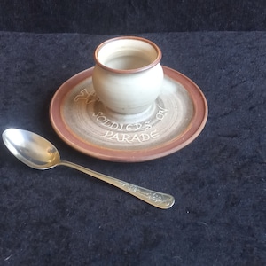 Lovely studio pottery SOLDIERS ON PARADE hand thrown egg cup on saucer with adorable drummer boy vintage spoon.perfect for all dippy eggs