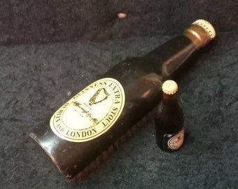 Novelty advertising Wooden Clothes Brush, Guinness Bottle c1953 and matching miniature guiness bottle unopened.
