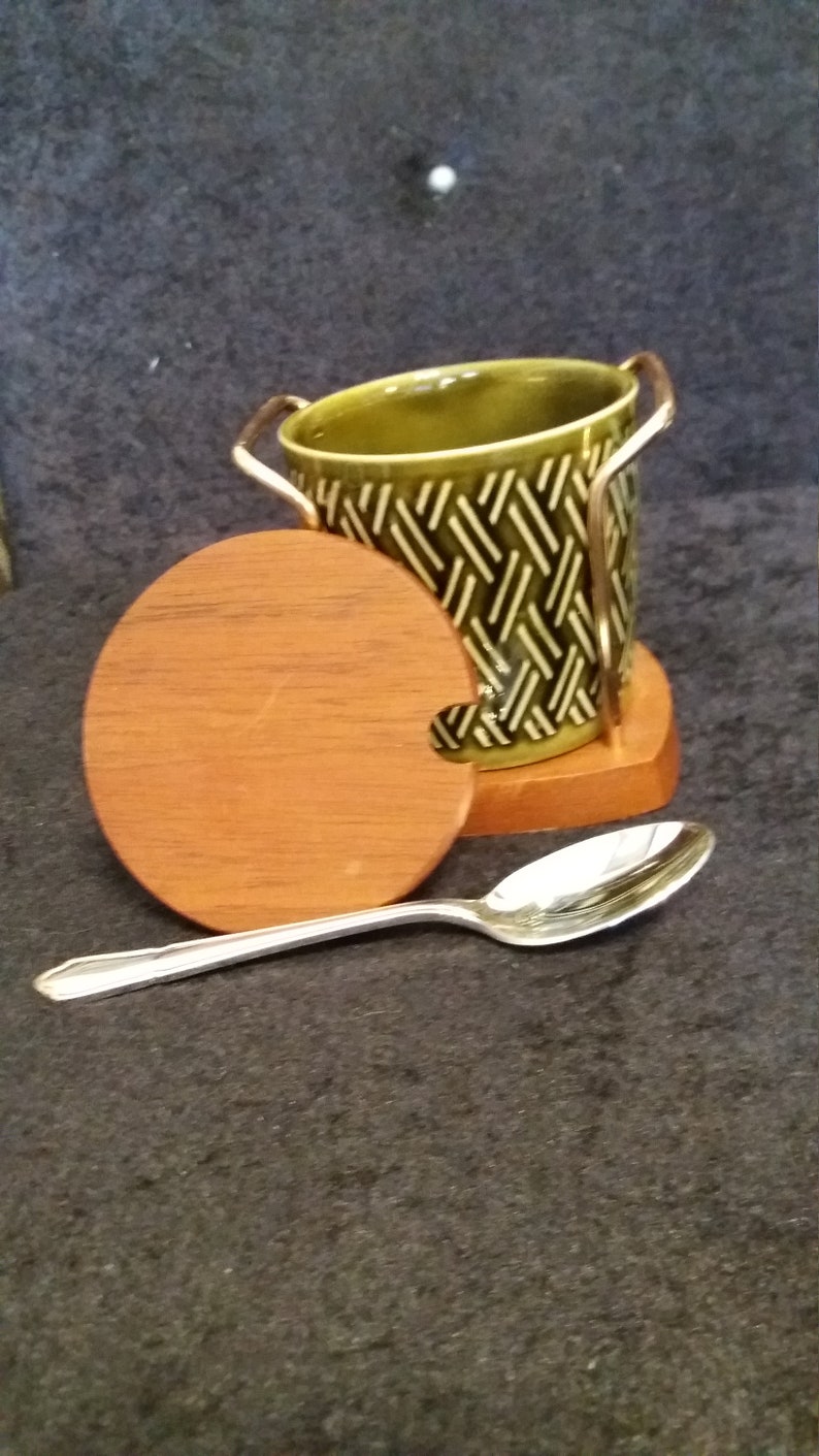 lovely sage green embossed honey.preserve or marmalade pot vintage Lord Nelson pottery and Wyncraft hopefully in its original wooden stand