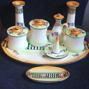 Beautiful complete Art Deco porcelain dressing table set.1920s Bohemian 12 piece vanity set with pink roses and strong black lines
