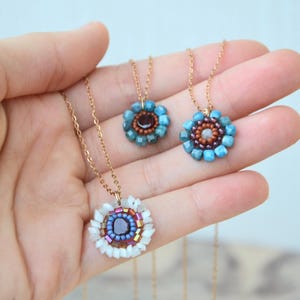 This collection is something new for me. I loved making these tiny flowers, more are coming soon! 
The pendant's size is 15 millimetres in diameter. 
The chain's length is 44.5-46 cm, or just send me a dm if you need a different measure!