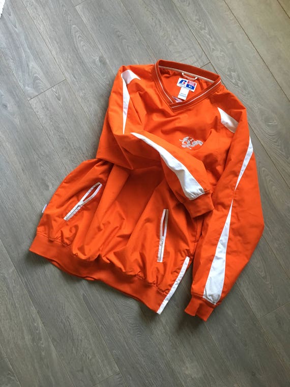 bright orange windbreaker