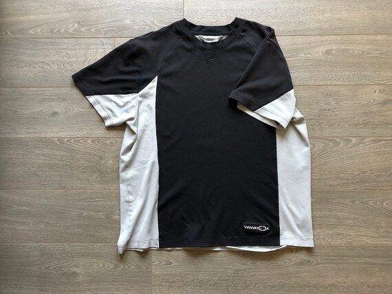 silver nike shirt