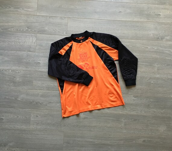 orange goalie jersey
