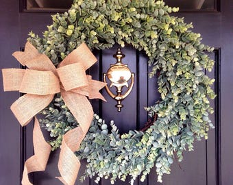 Farm house wreath , eucalyptus wreath with burlap bow .