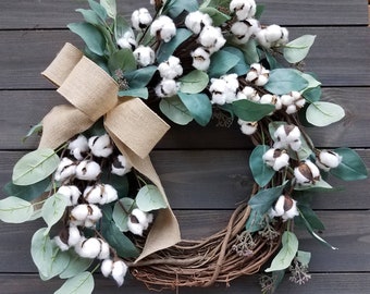 Natural cotton bolls with faux eucalyptus wreath