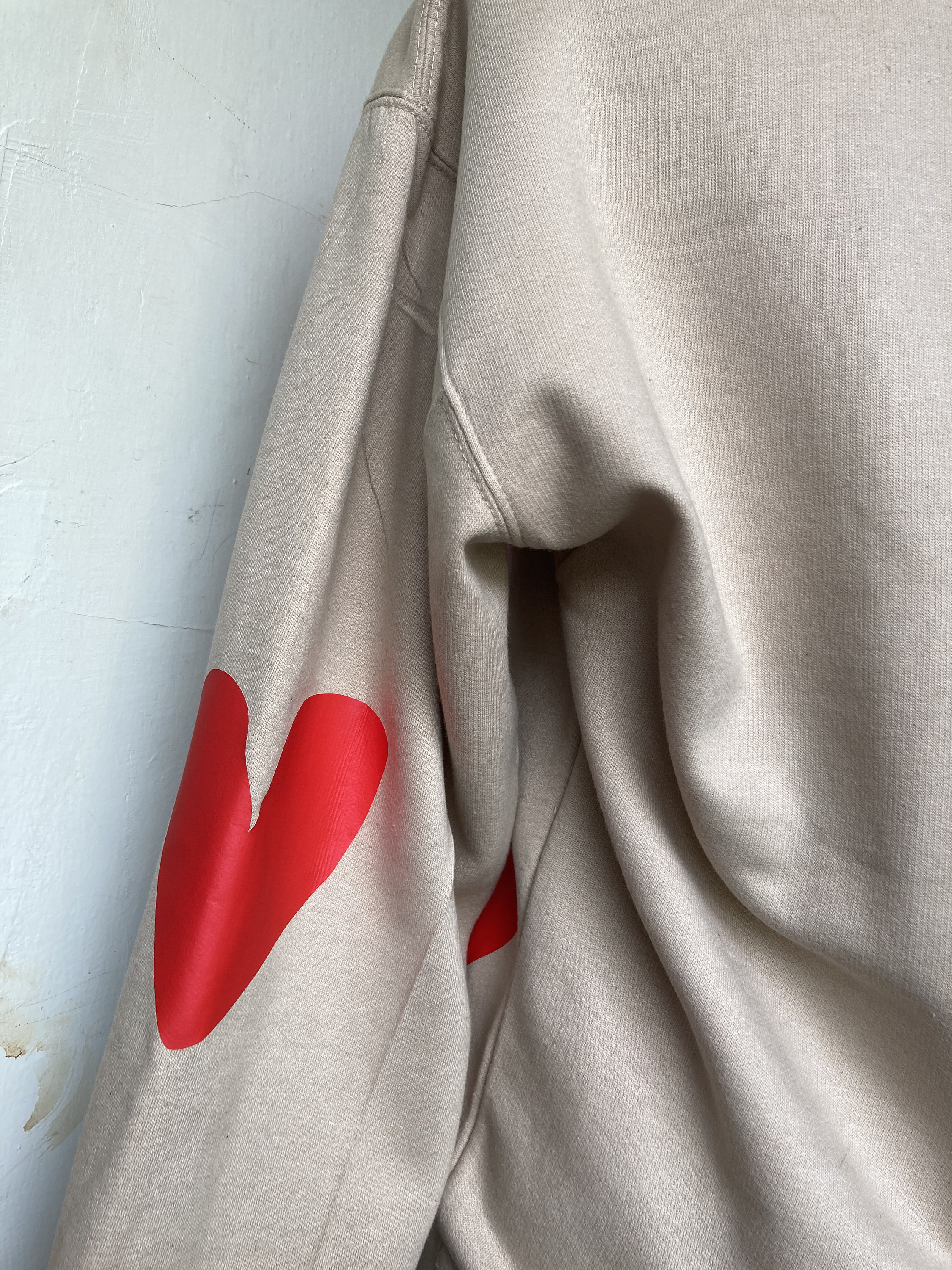 pink and red heart jumper