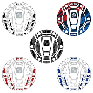 May include: Five different gas tank cap stickers for a motorcycle. The stickers are round and feature a black and white, gray and black, red and blue, white and red, and white and blue design. Each sticker has the text "GS" and "R1200" on it. One sticker also has the text "EXCLUSIVE" on it.