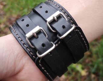 Bracelet de force - Une, deux ou trois sangles - Noire avec une couture marron.