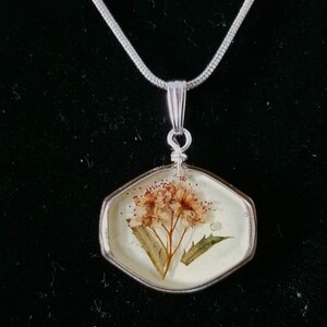 Pressed spirea flower resin necklace