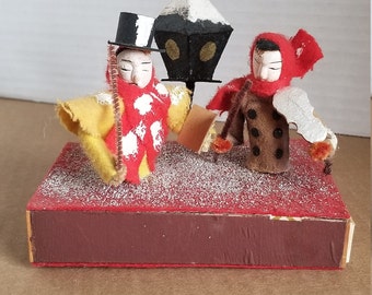 Vintage luciferdoosje versierd met feestdagen