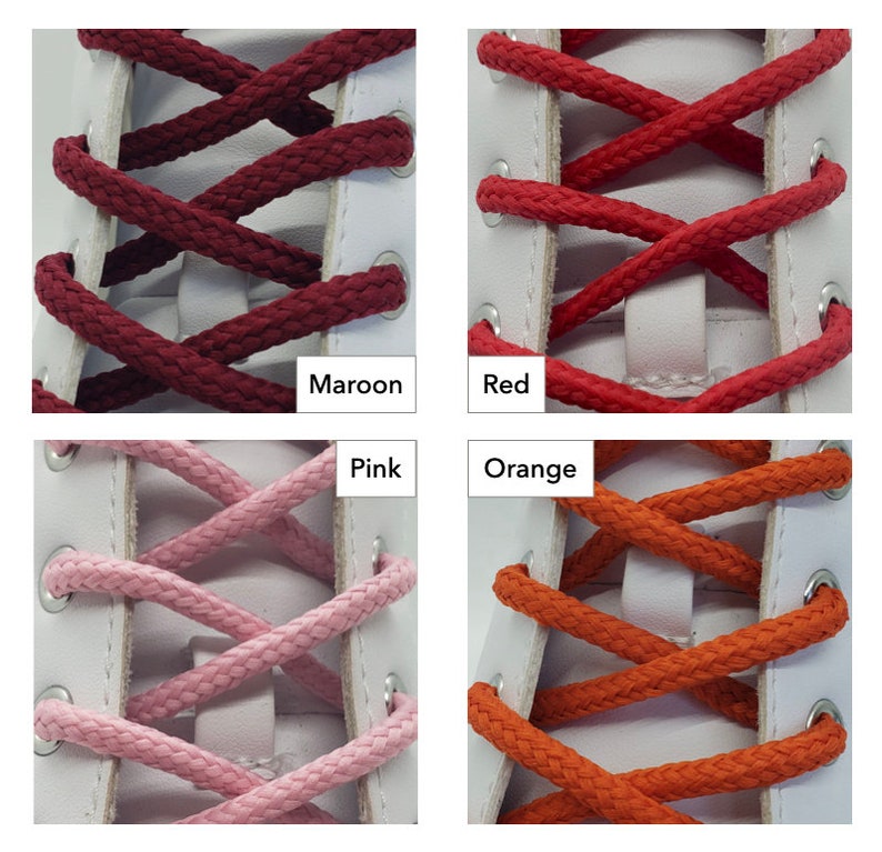 Op de afbeelding: Vier paar veters in verschillende kleuren: bordeauxrood, rood, roze en oranje. De veters zijn geknoopt in een kruispatroon op een witte schoen.