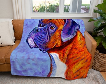 May include: A colorful painting of a Boxer dog with orange, red, purple, and white fur. The dog is looking to the left of the image. The background is a light blue with purple and white accents.