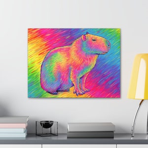 Psychedelic Rainbow Cute Capybara Trippy Stretched Canvas Wall Art Print on wall above desk