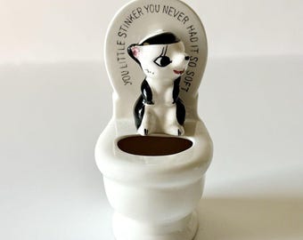 VNTG JAPAN Porcelain SKUNK Figurine on Toilet "You Little Stinker" Mid-Century