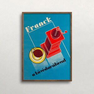 May include: A vintage poster advertising Franck coffee with a red coffee grinder and a cup of coffee on a blue background. The text reads "Franck a k&aacute;vedar&aacute;l&oacute;val".