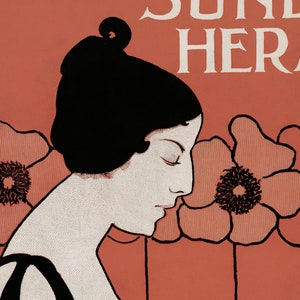 May include: Art nouveau illustration of a woman in profile with closed eyes, set against a coral background. The woman has black hair and is framed by large, stylized coral-coloured flowers. The text "SUNDAY HERALD" is at the top.