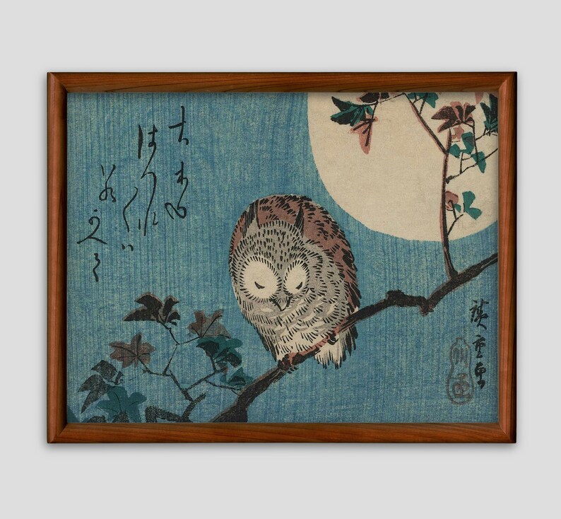 May include: A woodblock print of an owl perched on a branch with a full moon in the background. The owl is brown and gray with large, dark eyes. The branch is bare except for a few leaves. The moon is white and surrounded by a blue sky. The print is signed in Japanese characters.