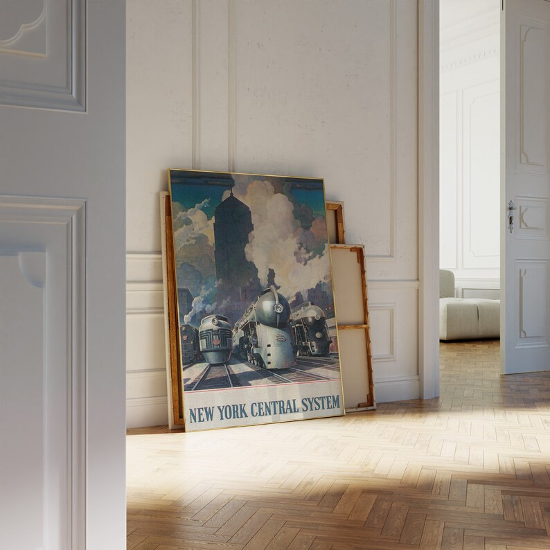 May include: A vintage poster featuring a train with the text "NEW YORK CENTRAL SYSTEM". The poster is framed in gold and has a blue, white, and gray color scheme.