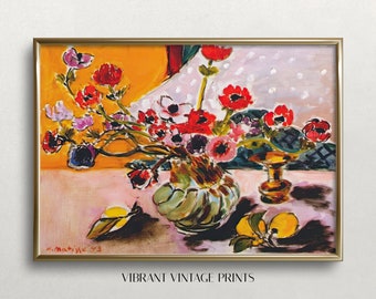 May include: A painting of a still life featuring a vase of red, pink, and purple flowers with green leaves. The vase is on a table with two lemons and a gold stand. The background is a yellow wall with a white tablecloth.
