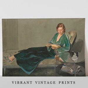 May include: A woman in a teal green robe sits on a chaise lounge and reads a book. She is wearing a pair of silver high heels. The chaise lounge is in a room with a glass-top table and a stack of books.