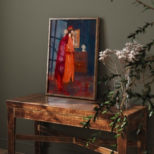 May include: A framed painting of a woman in a red and orange dress standing in a room with a blue wall. The woman is wearing a red hat and is looking at a mirror.