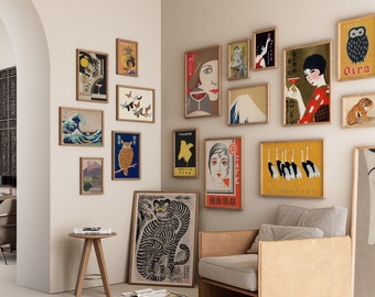 May include: A collection of framed art prints in various sizes and styles, including Japanese-inspired designs. The prints feature images of owls, tigers, landscapes, and figures, with a color palette of blues, yellows, and reds. The frames are made of wood.