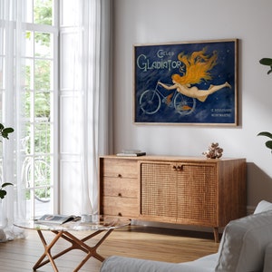 May include: Vintage poster advertising Gladiator bicycles. The poster features a woman with flowing red hair riding a bicycle against a dark blue background with stars. The text on the poster reads "Cycles Gladiator 17, Boulevard Montmartre".