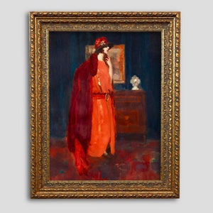 May include: A painting of a woman in a red dress and a red hat standing in a room with a dark blue wall. She is looking to the right and holding a fan in her left hand. There is a dresser with a lamp on it in the background.