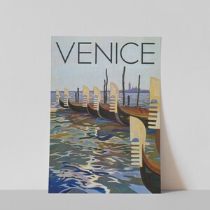 May include: A vintage travel poster featuring the word "VENICE" in large black letters above a row of gondolas on the water. The gondolas are brown and black, with light-colored decorative elements. The water reflects the sky and gondolas.