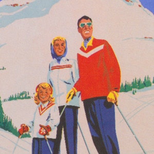 May include: A family of three wearing winter clothing and holding ski poles. The father is wearing a red sweater, the mother is wearing a white jacket, and the child is wearing a white sweater. They are standing in front of a snowy mountain.