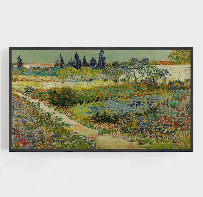 May include: A framed print of a garden scene, with a path winding through a colourful array of flowers and foliage. The artwork, in a rectangular black frame, features greens, blues, yellows, and reds, creating a sense of nature and tranquility.