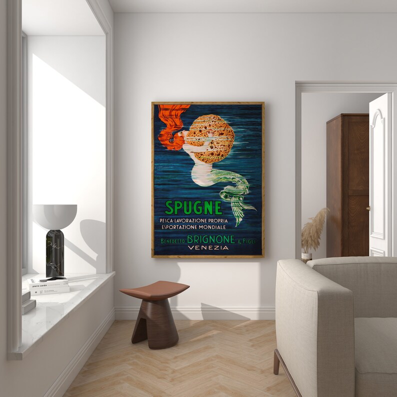 May include: Vintage poster advertising Spugne, a brand of sponges. The poster features a mermaid holding a large sponge, with the text "Spugne, Pelica Lavorazione Propria, Esportazione Mondiale, Benedetto Brignone e Figli, Venezia".