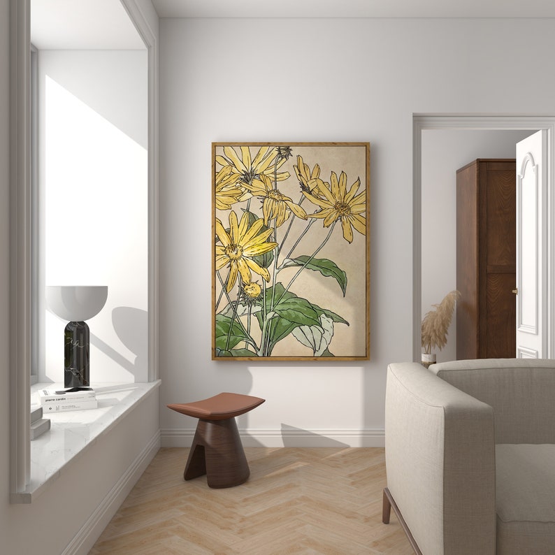 May include: A framed print of a botanical illustration featuring yellow flowers with green stems and leaves on a beige background.
