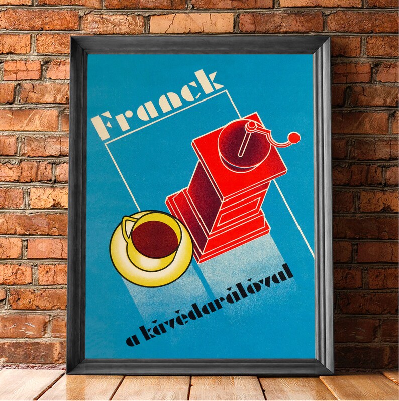 May include: A vintage poster advertising Franck coffee and a coffee grinder. The poster features a red coffee grinder with a blue background and the text "Franck" and "a k&aacute;v&eacute;dar&aacute;l&oacute;val" in black.