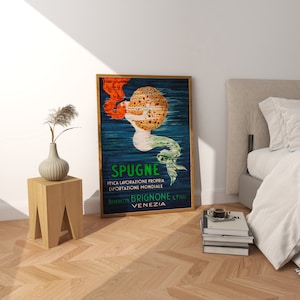 May include: Vintage poster advertising Spugne Brignone & Figli, a brand of sponges from Venice, Italy. The poster features a mermaid holding a large sponge, with the text "Spugne" and "Peica Lavorazione Propria Esportazione Mondiale" in green and black.