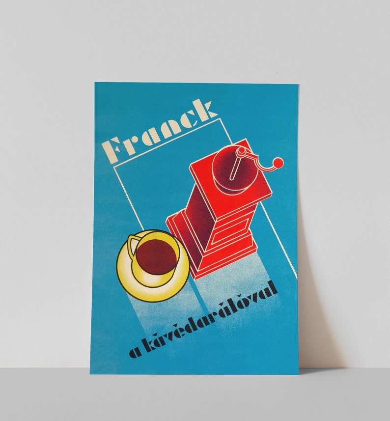 May include: A vintage poster advertising Franck coffee with a red coffee grinder and a yellow cup of coffee. The poster has the text "Franck" and "a k&aacute;v&eacute;dar&aacute;l&oacute;val" in black.