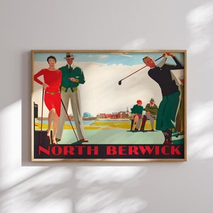 May include: Vintage golf-themed poster with a wooden frame. The artwork depicts a golfer mid-swing, a couple, and spectators. The text "NORTH BERWICK" is displayed in red on a black background. The color palette includes red, green, and beige.