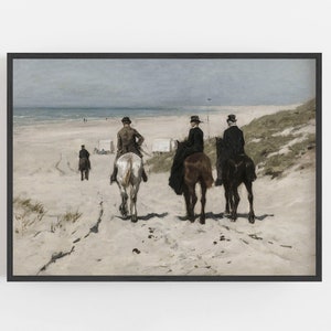 May include: An antique-style framed print depicts three people riding horses on a sandy beach. The riders are dressed in period clothing, with the ocean and a cloudy sky in the background. The artwork has a vintage aesthetic.