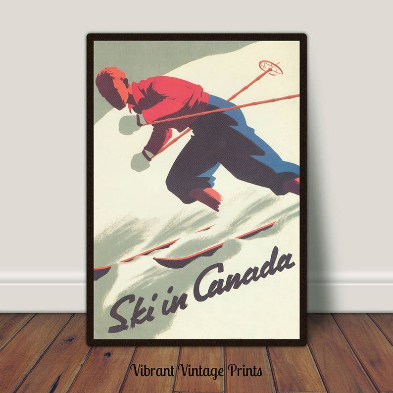 May include: Vintage poster print featuring a skier in red and blue attire, skiing down a snowy slope. The poster has the text "Ski in Canada" and is framed in a dark brown border. The bottom of the poster has the text "Vibrant Vintage Prints".