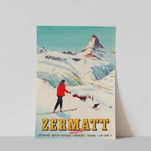 Puede incluir: Un cartel de viaje vintage para Zermatt, Suiza, con un esquiador con ropa roja sobre un fondo de monta&ntilde;a nevada. El pico del Matterhorn se muestra prominentemente en el fondo. El texto del cartel dice "Zermatt, Suiza, Matterhorn - Riffelalp - Riffelberg - Gornergrat - Blauherd - 5330-10280 ft."