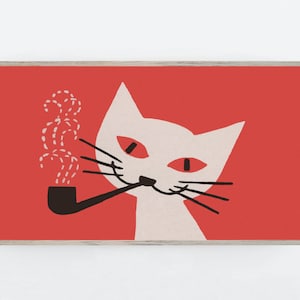 May include: A framed art print featuring a stylized white cat with red eyes smoking a pipe. The cat is set against a solid red background. The artwork has a mid-century modern aesthetic.