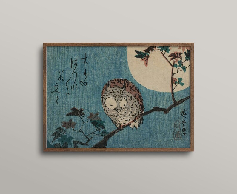 May include: A vintage Japanese woodblock print depicting an owl perched on a branch with a full moon in the background. The print is framed in a brown wood frame. The text in the image reads "夜ふかし" which translates to "staying up late".