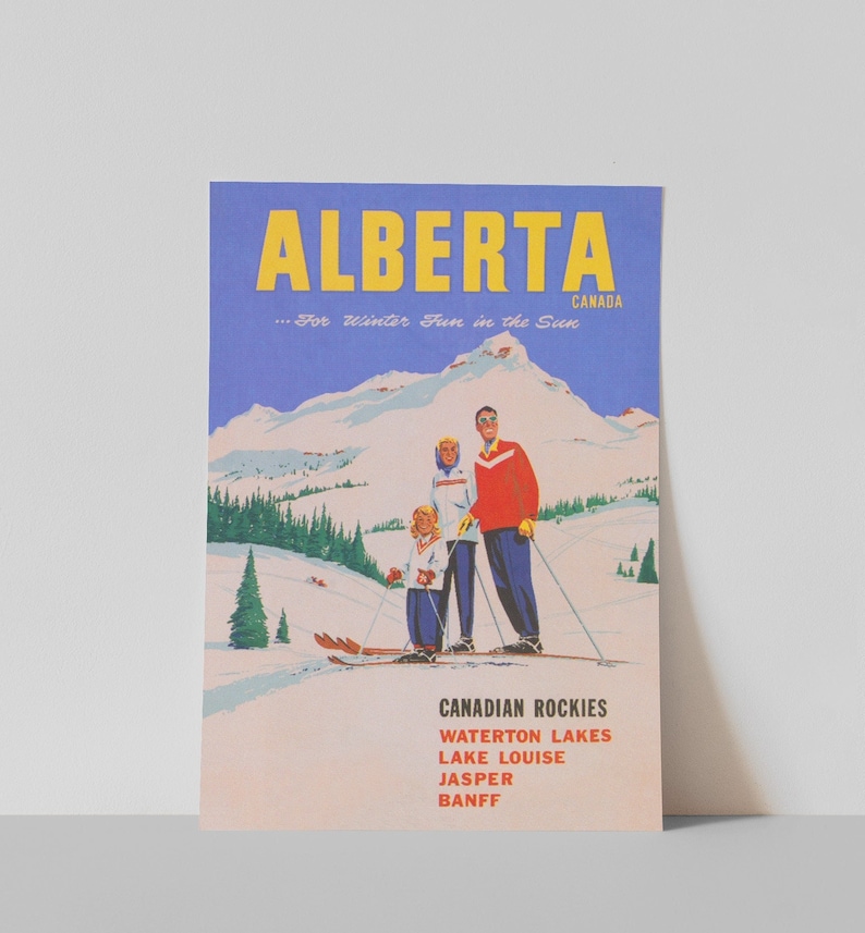 May include: A vintage travel poster advertising winter fun in Alberta, Canada. The poster features a family of three skiing down a snowy mountain slope. The text reads "Alberta...For Winter Fun in the Sun" and lists the Canadian Rockies, Waterton Lakes, Lake Louise, Jasper, and Banff.