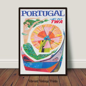 May include: A vintage travel poster advertising flights to Portugal with TWA airlines. The poster features a colorful illustration of a mermaid in a boat with a windmill in the background. The text "PORTUGAL FLY TWA" is displayed at the top of the poster.