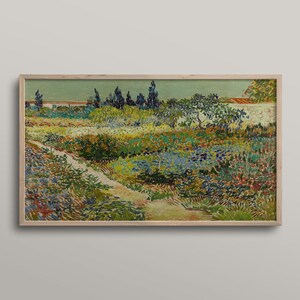 May include: A framed print of a garden scene, depicting a path through colourful flowers and foliage. The artwork has a textured, impressionistic style with a light green sky and a wooden frame. The painting depicts a sunny day.