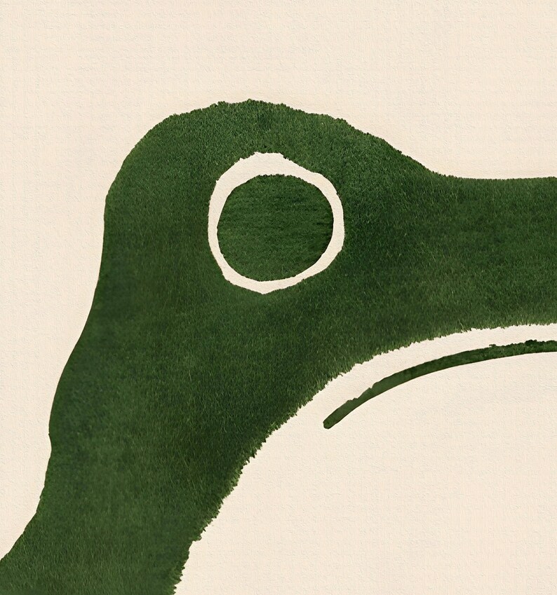 May include: Abstract watercolor painting of a green shape with a white circle in the center. The shape resembles a bird's head.
