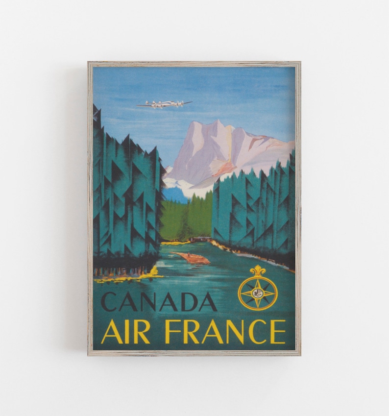 May include: Vintage travel poster featuring a blue and green landscape with a mountain range in the background. A white airplane flies over the trees. The text "CANADA AIR FRANCE" is in yellow letters on a blue background. A compass with a gold crown is in the bottom right corner.