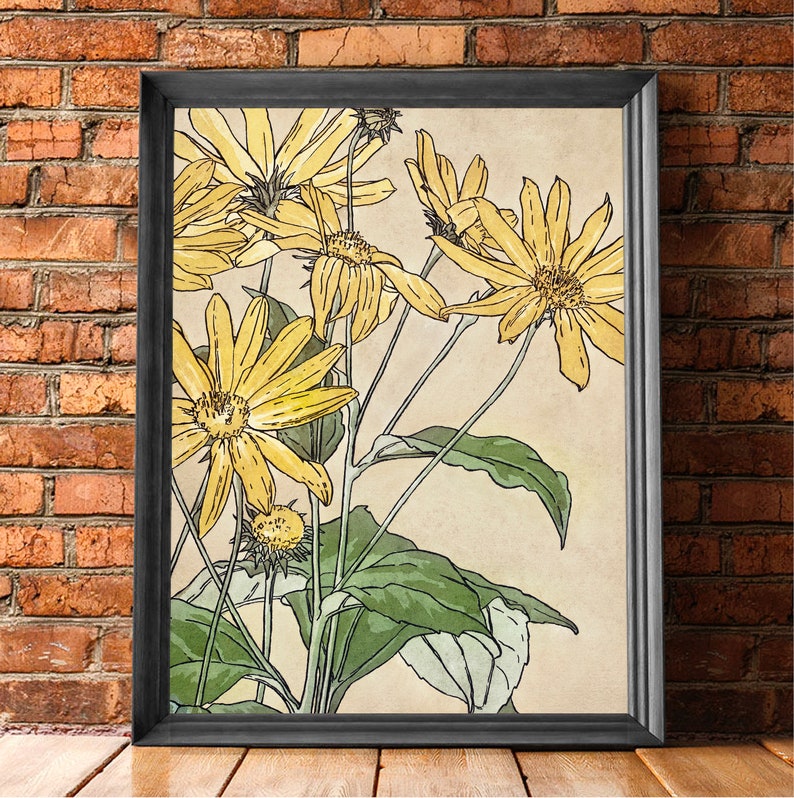 May include: A framed print of a botanical illustration featuring yellow flowers with green leaves on a cream background.